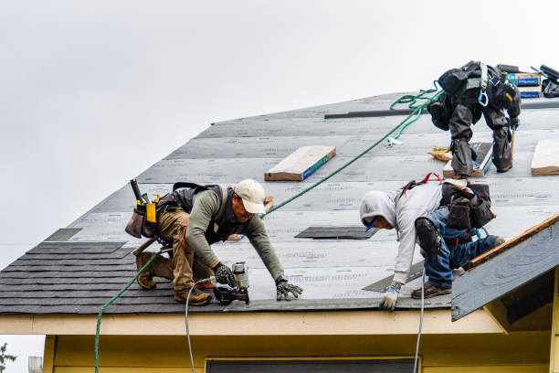 Professional Storm Damage Roof Repair technician working in Northwood, NH